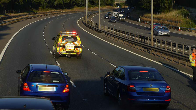 Can motorway traffic officers give tickets?