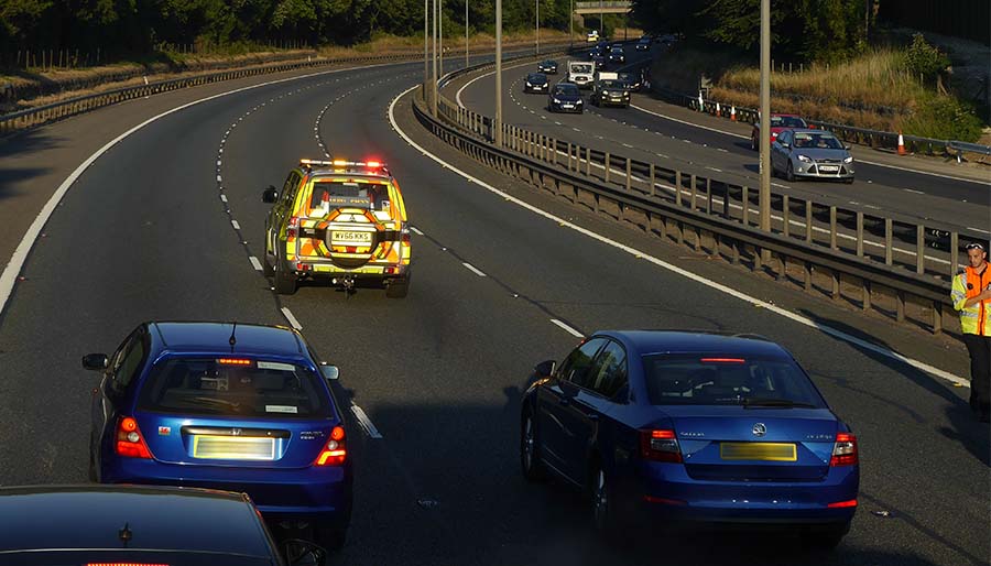 Can motorway traffic officers give tickets for phone use or speeding?