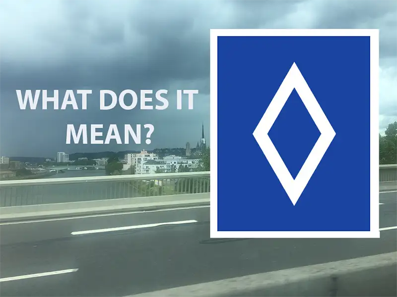 What does a white diamond road sign mean in France?