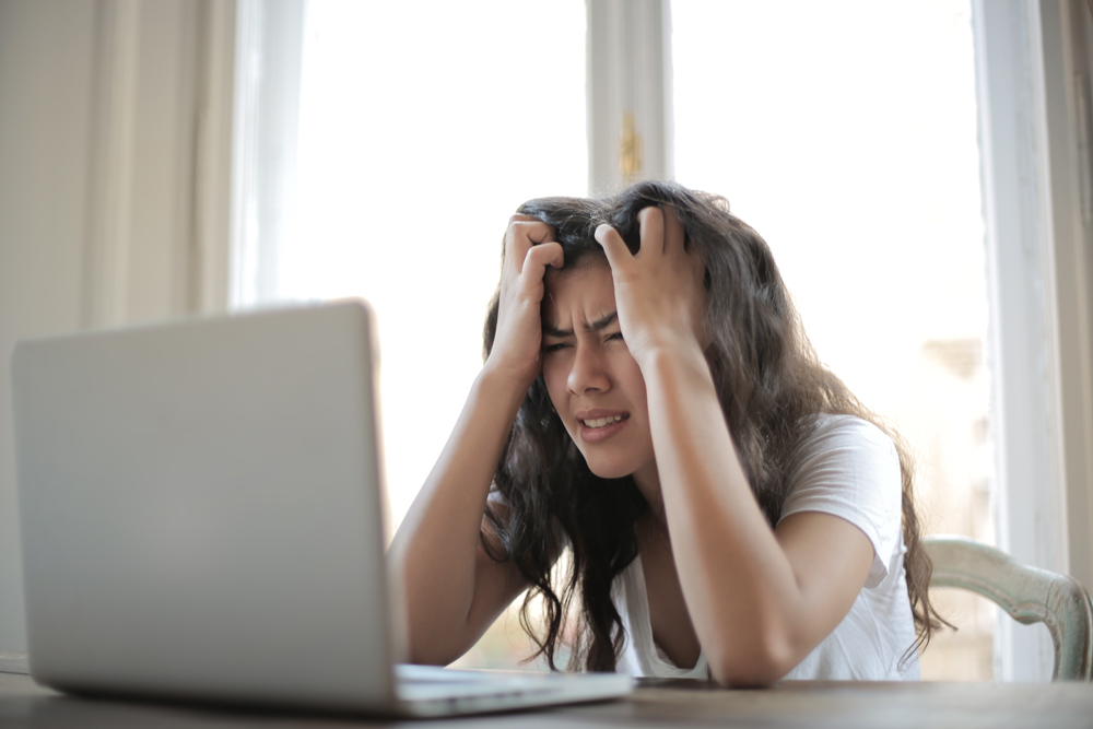 Woman stressed searching for item left on a plane